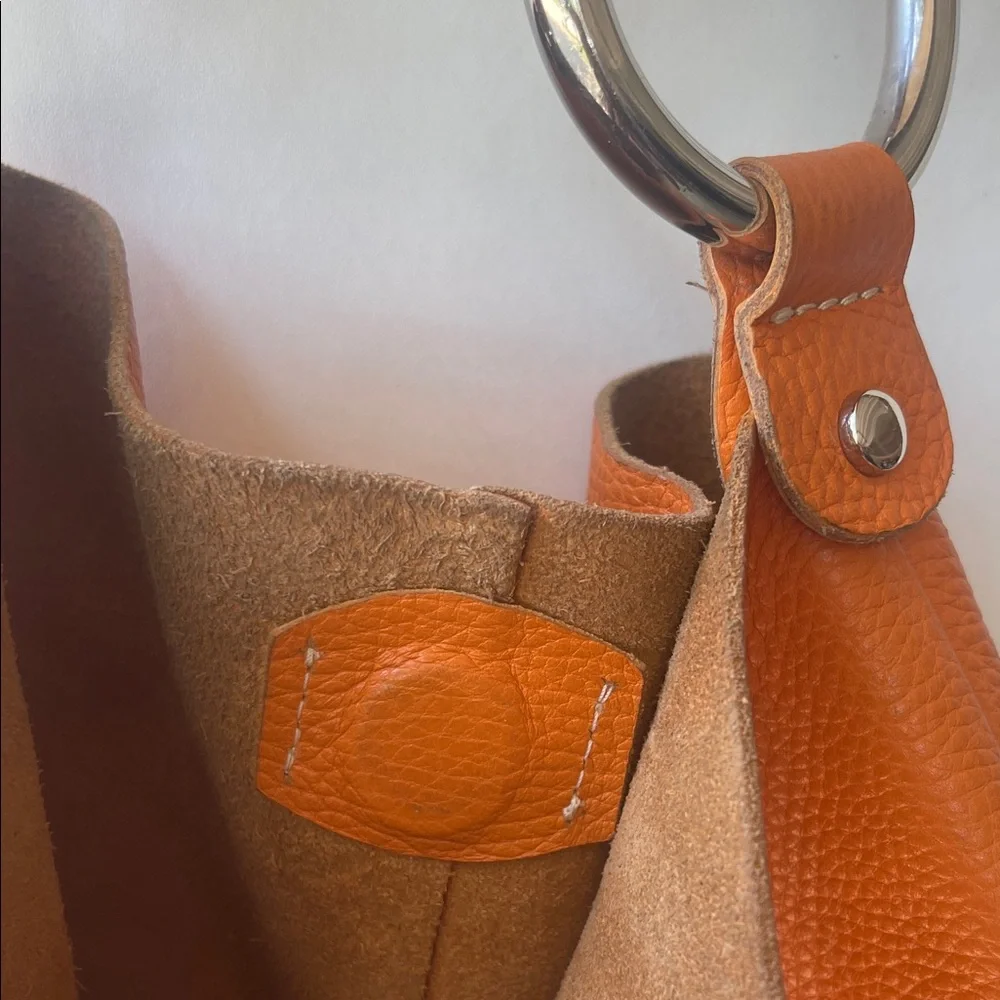 Chic‎ Orange Hobo Bag with Silver Accents